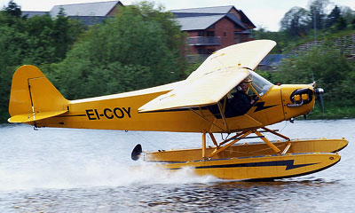 Piper Cub on floats ready for take off